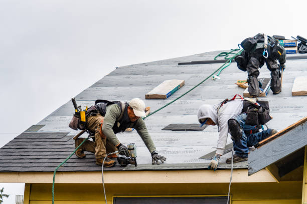 Professional Roof Replacement technician working in Montclair, NJ